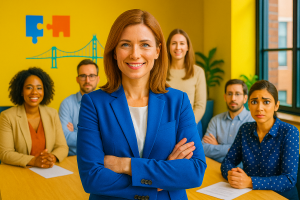 A confident woman in a royal blue suit stands at the forefront of a modern office meeting room, arms crossed and smiling directly at the camera. Behind her, a diverse group of five colleagues is seated and standing around a table, displaying a range of ex